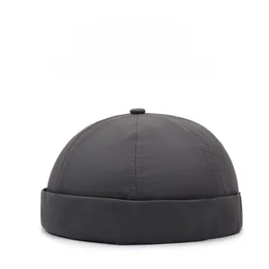Detail of dark gray quick-dry docker hat fabric with breathable and sweat-wicking texture