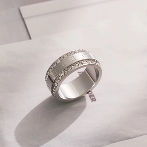 Silver titanium steel ring with roman numerals and clear cubic zirconia stones