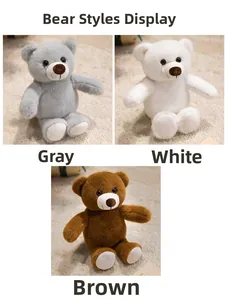 Détail de peluches ours en couleurs gris, blanc et marron pour enfants