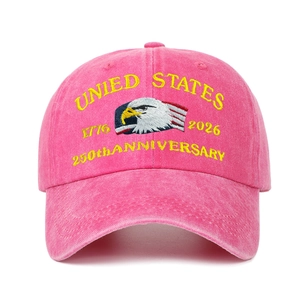 Close-up of pink washed cotton baseball cap with 250th anniversary eagle embroidery