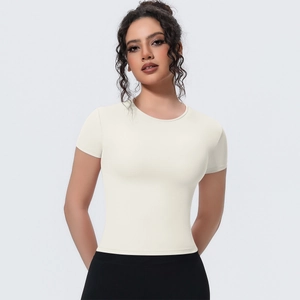Close-up of cream slim fit yoga t-shirt with breathable fabric and athletic crew neck