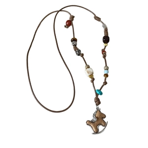 Ethnic brown braided rope necklace featuring wooden horse pendant with sparkly rhinestones