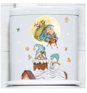 Detailed view of Santa and Reindeer Christmas stickers on a white toilet water tank