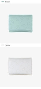 Detailed view of trifold PU leather wallets in white and green with embossed cute animals