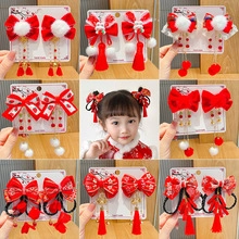 Collage of red New Year hair clips with tassels and bells for girls' hanfu outfits