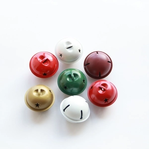 Detailed view of 4cm colorful star-cutout metal bells for DIY Christmas decor