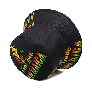 Detail of One Love Jamaica print with palm tree on black canvas bucket hat