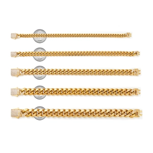 Gold Cuban link chains in 5 sizes with diamond clasps shown next to a coin for scale