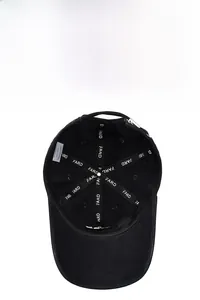 Detail view of the black 100% cotton baseball cap interior with reinforced stitching