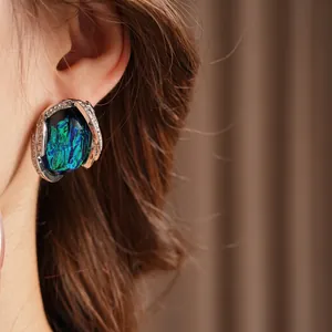 Vintage style teal resin oval earrings with sparkling crystal accents for women