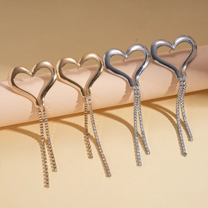 Luxurious gold and silver heart tassel earrings with sparkling rhinestones in four pairs