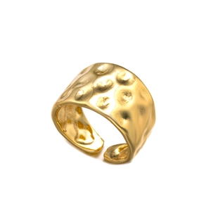 Minimalist golden hammered texture open ring with adjustable band on white background