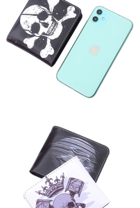 Detail of short leather wallets with rock gothic skull prints and white stitching finish