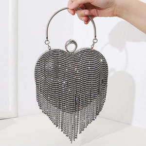 Elegant heart-shaped evening bag with silver rhinestone fringe and metallic handle