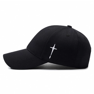 Black cotton baseball cap featuring white dagger cross embroidery on side panel