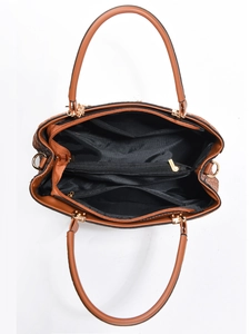 Top view of brown leather handbag showing internal pockets and gold zipper detail