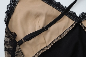Close-up of black lace detail with adjustable shoulder straps and khaki lining
