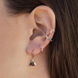 Chic rose gold bee earrings set with colorful zircon gemstones worn on ear