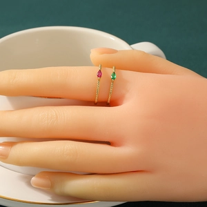 Exquisite 18K gold plated ring set featuring marquise cut ruby and emerald gemstones