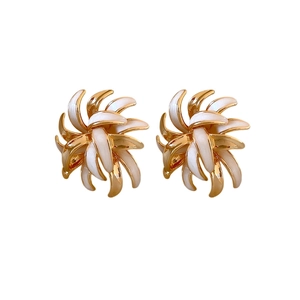 Vintage gold-plated spiral daisy earrings with white enamel petals for women