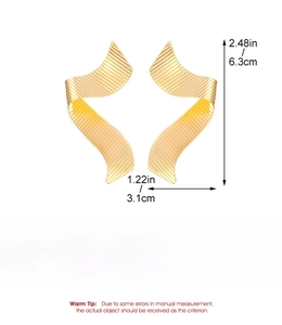 Detail view of gold ribbon earrings with 6.3cm size dimensions and alloy material specs