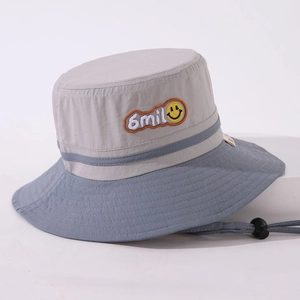 Kids color-block bucket hat with 6mile embroidery and smiley face patch in grey and blue