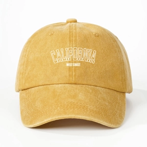Detailed close-up of CALIFORNIA WEST COAST print on washed cotton baseball cap