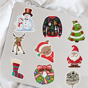 Christmas cartoon stickers with Santa and reindeer patterns on a laptop case cover