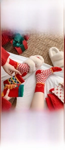 Detail of red festive crew socks featuring 200-needle knit and 40s fine yarn texture