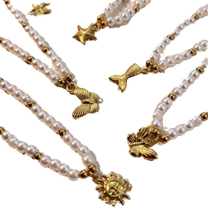 Chic stainless steel pearl beaded necklaces with butterfly and sun star pendants