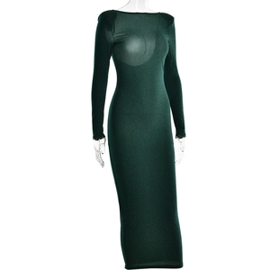 Detailed view of dark green shimmer fabric and sleek bodycon fit on a long sleeve dress