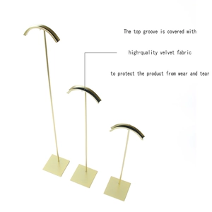 Three-piece gold metal jewelry stand set with protective black velvet lined top hooks