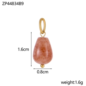 Detail view of pink natural stone drop pendant with 1.6cm height and gold ring attachment