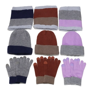 Detailed grid view of knitted winter set including pom beanie, scarf, and gloves in three colors