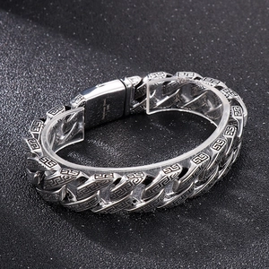 Polished stainless steel Cuban link bracelet with Greek key pattern for men