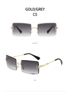 Detail view of rimless square sunglasses with gold frame and gradient grey lenses for women.