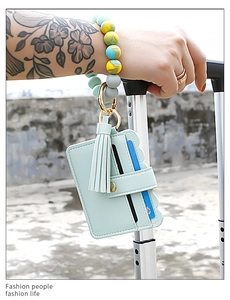 Mint green silicone bead wristlet keychain with matching PU leather card holder and tassel