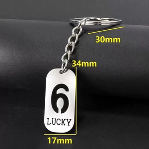 Detail view of LUCKY number 6 stainless steel keychain with precise size measurements