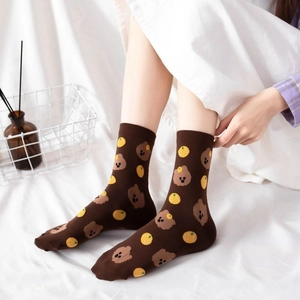 Japanese style cute brown bear cotton mid-calf socks for women in cozy home setting
