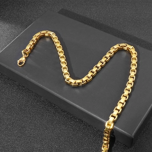 Detail of 7mm gold plated stainless steel box chain necklace with lobster clasp