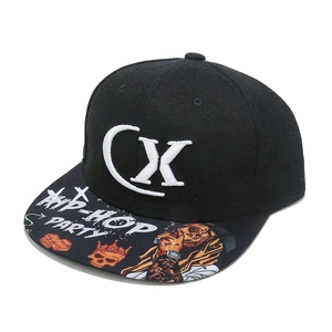 Detail of hip-hop flat brim cap with 3D CX embroidery and graffiti print patterns
