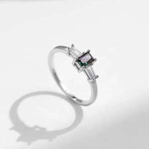 S925 sterling silver ring featuring a rectangular colorful zircon on a white background