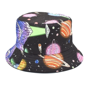 Detailed view of the vibrant galaxy and UFO print on a black bucket hat surface