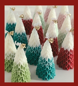 Close-up of Christmas tree candles with relief texture, gradient colors and gold bells