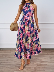 Detail of navy floral halter dress with pleated fabric and matching waist tie belt