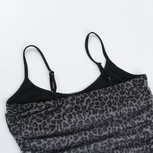 Close-up of grey leopard print mesh fabric with Ruched texture and adjustable straps