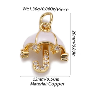 Macro view of gold umbrella charm with white cubic zirconia and technical dimensions