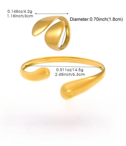 Detail view of gold stainless steel jewelry set featuring a matte teardrop ring and bangle