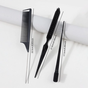 Detailed view of hair styling kit showing lengths of rat tail comb and edge brushes