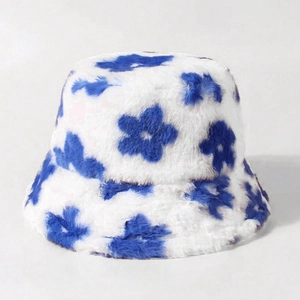 Plush floral bucket hat with blue flower patterns on white faux fur for winter warmth